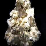 Microclina, Cuarzo y Epidota.
70x33 mm.
(Autor: Jesus Franquesa Baucells)