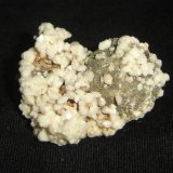 Pseudoleucita con Moscovita y Oligoclasa
4,5 x 3,3 x 3,1 cm
(Autor: Anisio Claudio)