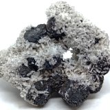 Siderita, Calcita
60x50x30 mm
(Autor: Luis Edmundo Sánchez Roja)