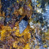 Wulfenita.
1´19 x 0´49 mm.
(Autor: Jesus Franquesa Baucells)