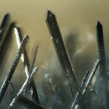 Zinkenita
0.9mm
(Autor: yowanni)