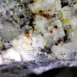 Zircón y Magnetita.
0´736 x 0´689 mm.
(Autor: Jesus Franquesa Baucells)