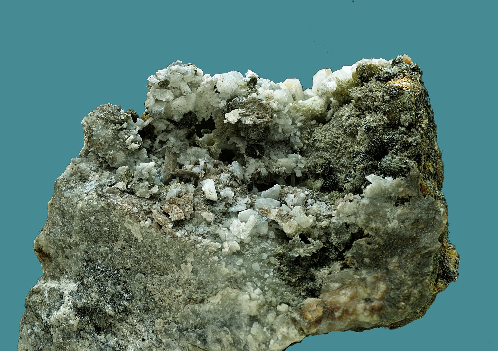 Titanita sobre albita.
73 x 53 mm.
(Autor: Antonio Carmona)